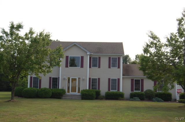 1261 Miller Road Wind Gap, PA 18091 - Photo 24 of 24 a front view of a house with garden