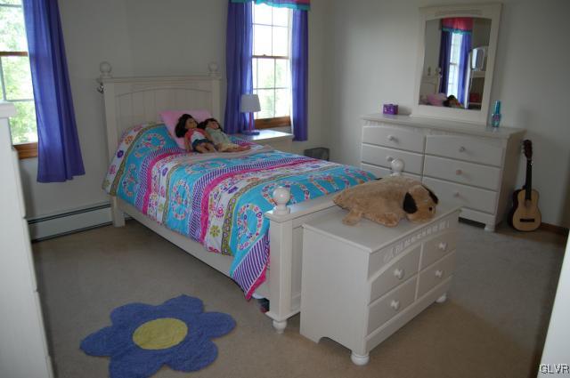 1261 Miller Road Wind Gap, PA 18091 - Photo 9 of 24 a bedroom with a bed and a window