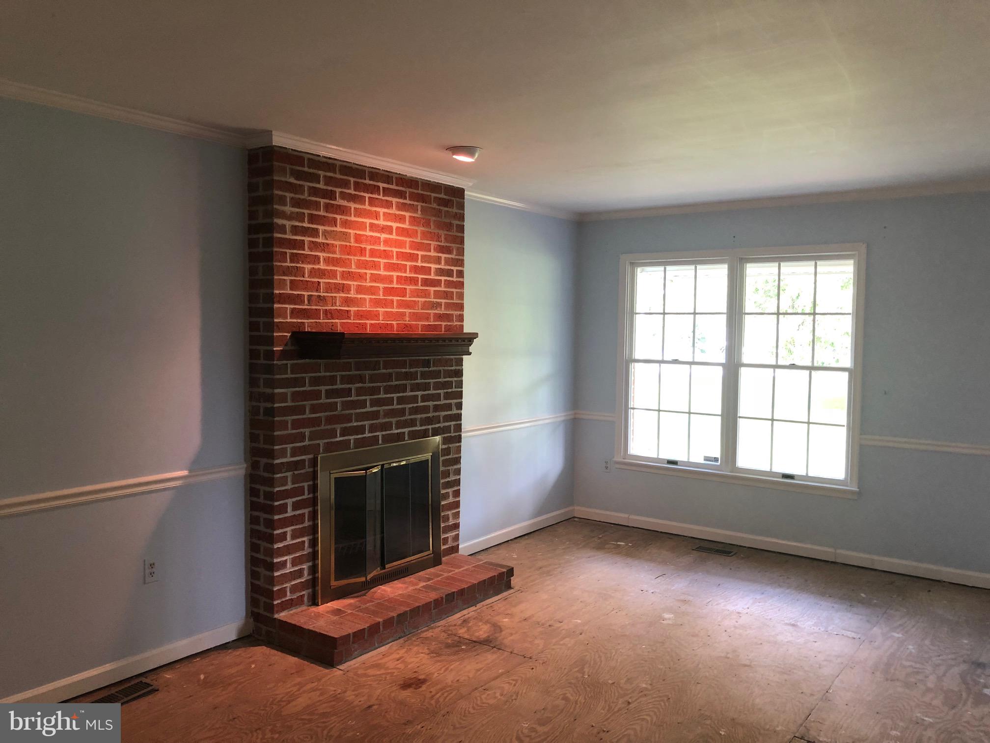 4333 Sweet Air Road Baldwin, MD 21013 - Photo 2 of 28 an empty room with windows and fireplace