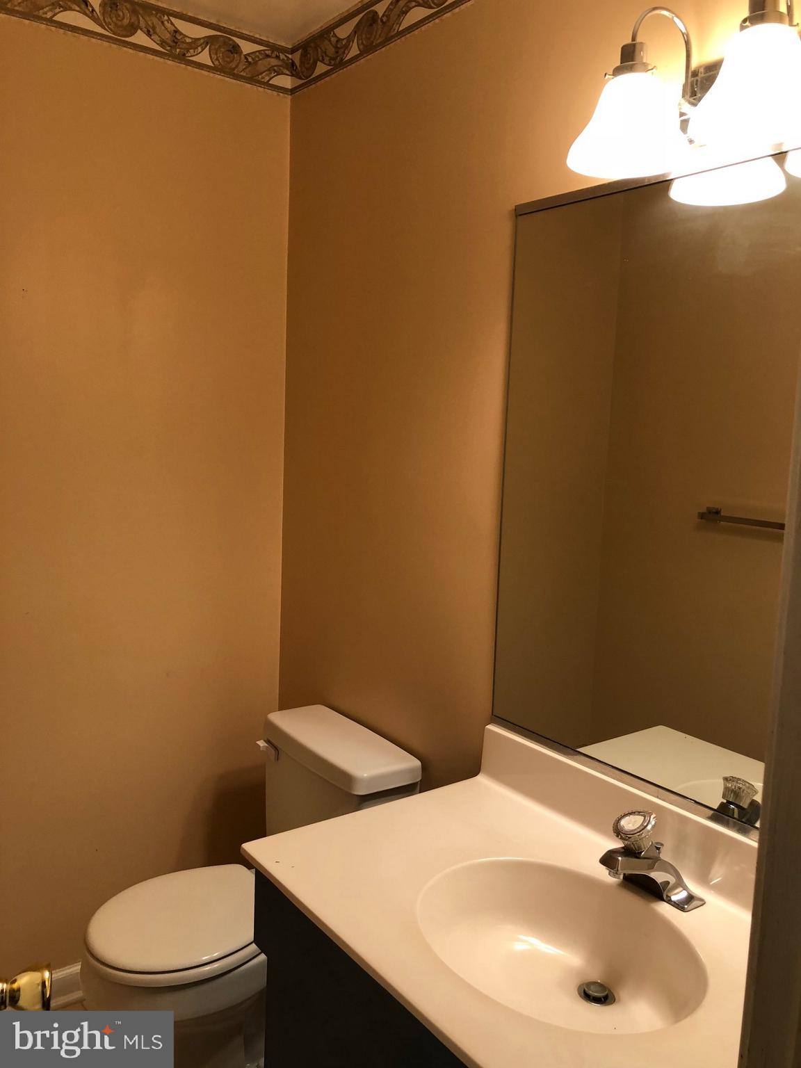 4333 Sweet Air Road Baldwin, MD 21013 - Photo 12 of 28 a bathroom with a sink and a toilet