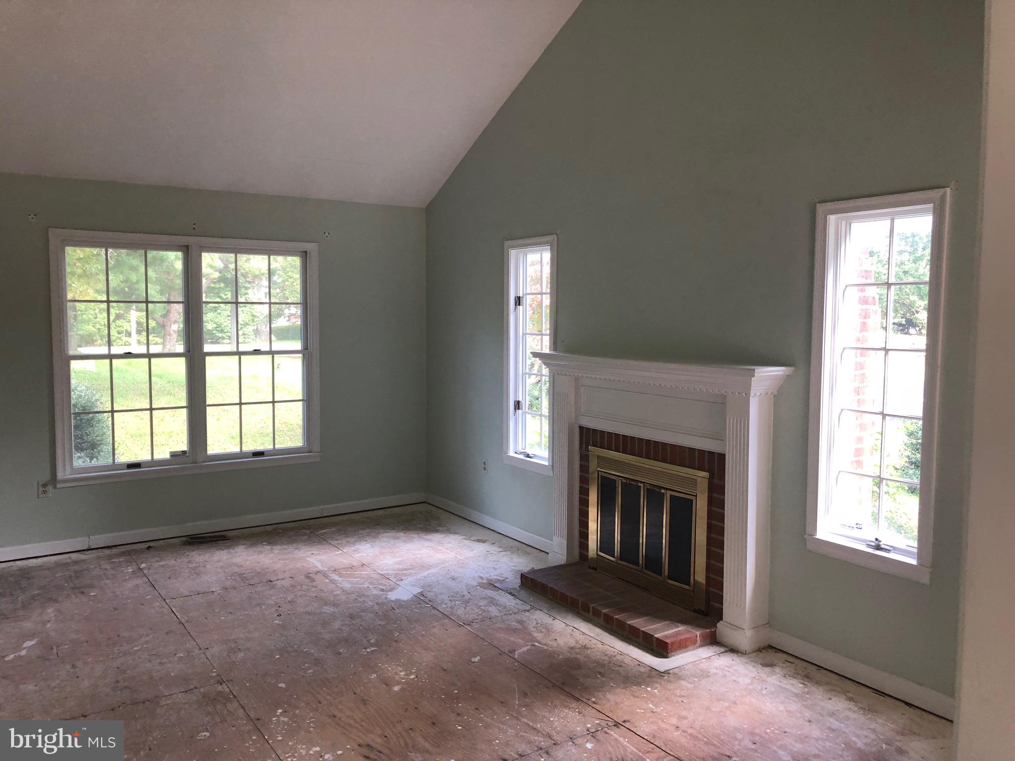 4333 Sweet Air Road Baldwin, MD 21013 - Photo 4 of 28 an empty room with windows and fireplace