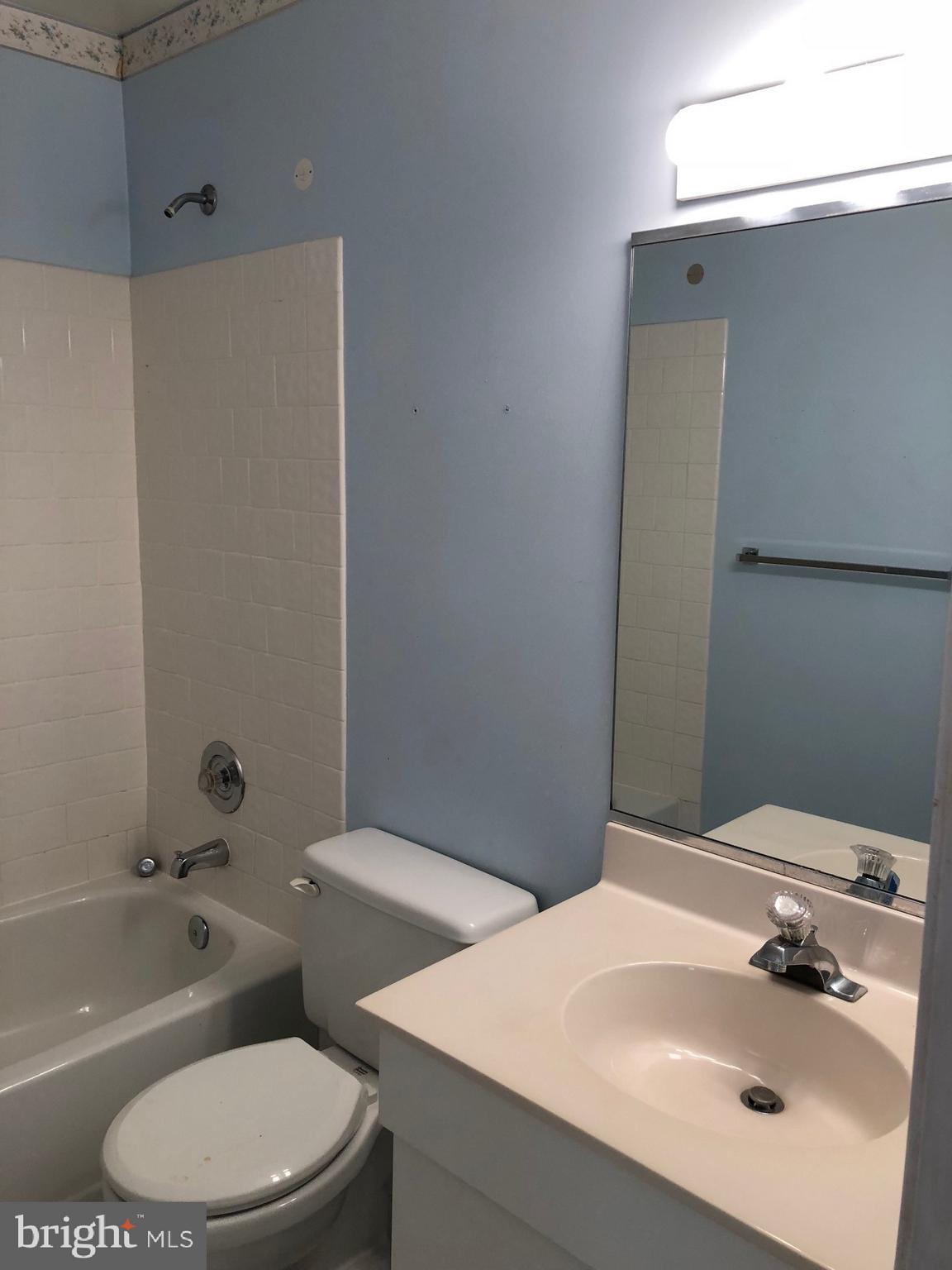 4333 Sweet Air Road Baldwin, MD 21013 - Photo 10 of 28 a bathroom with a sink toilet and shower