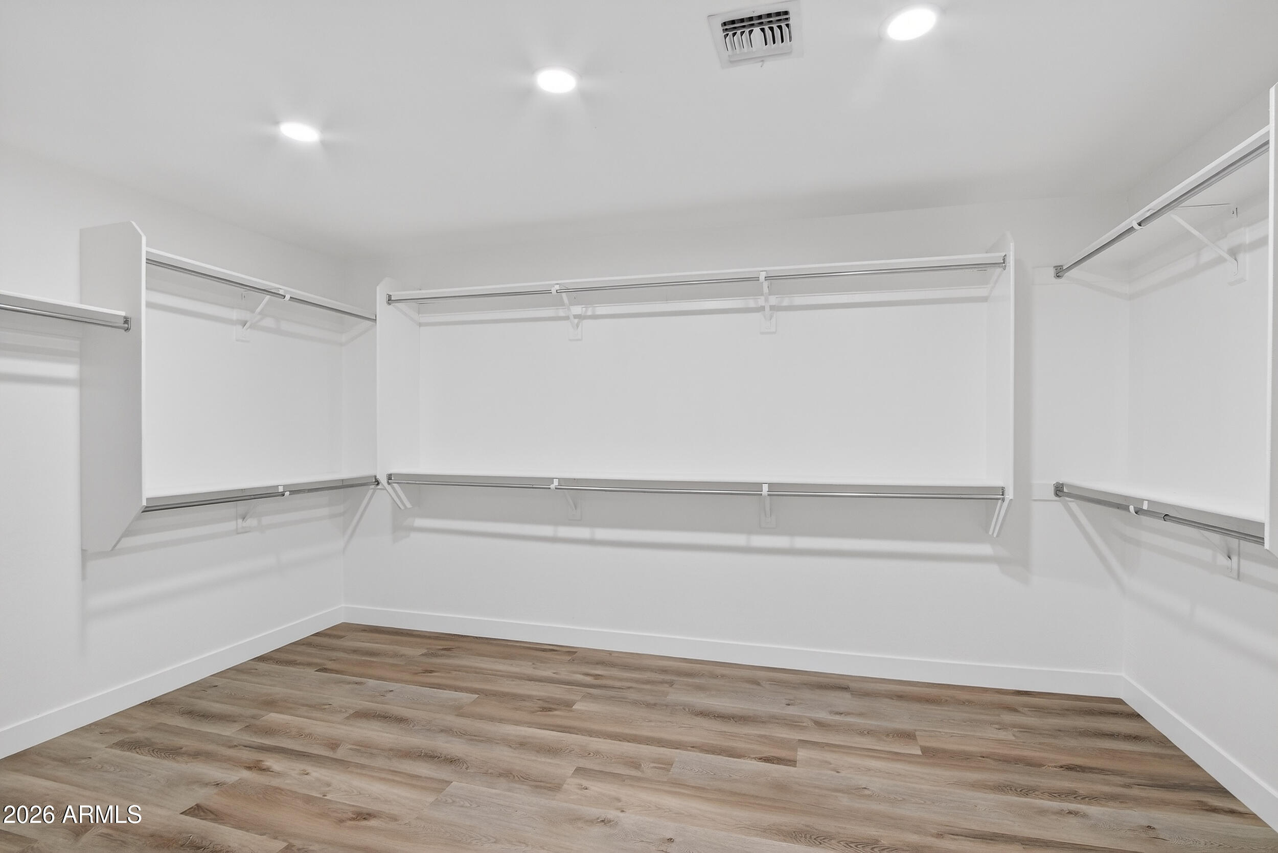 43620 West Cowpath Road Maricopa, AZ 85138 - Photo 38 of 60 a view of an empty walk in closet