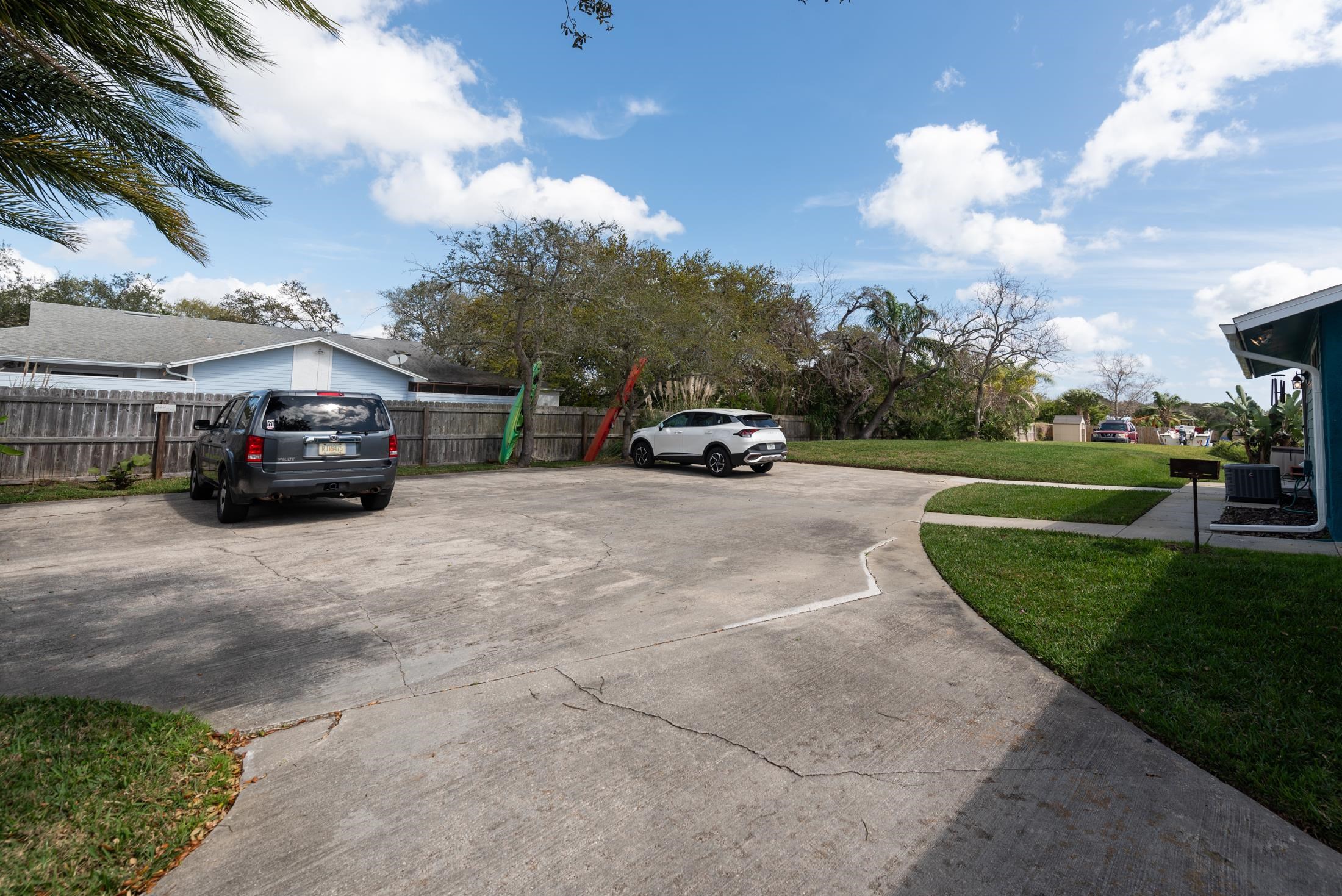 126 Rio Del Mar Street, Unit B St. Augustine, FL 32080 - Photo 22 of 24 a view of a car parked in front of a house