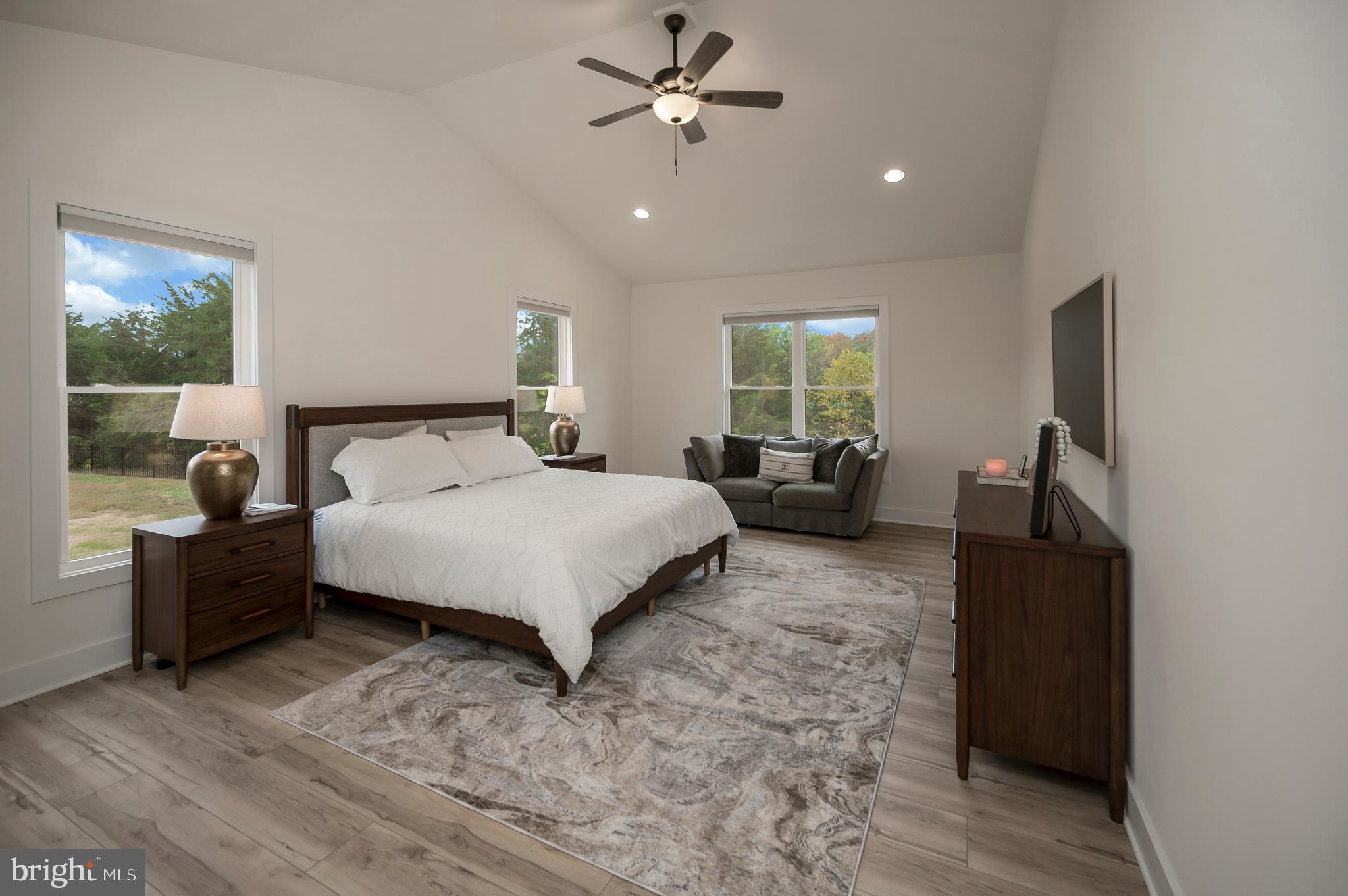 13121 Bristow Road Nokesville, VA 20181 - Photo 18 of 35 Primary Bedroom w/ LVP Flooring & Ceiling Fan