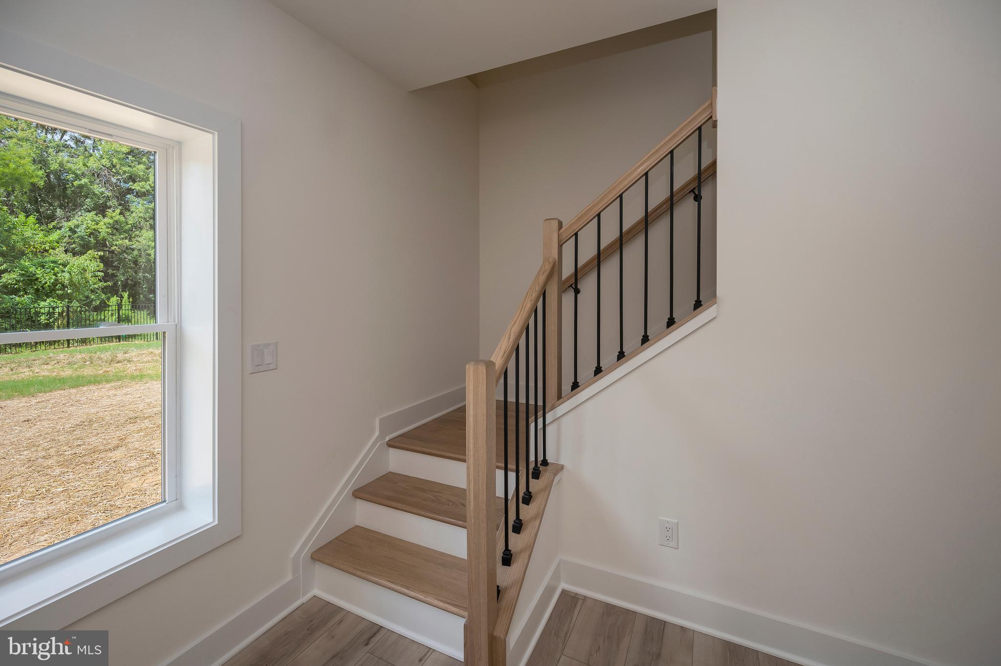 13121 Bristow Road Nokesville, VA 20181 - Photo 30 of 35 Oak Staircase to Lower Level