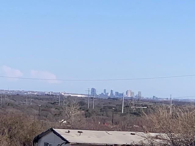 102 Sparrow Drive Azle, TX 76020 - Photo 9 of 9 a view of a dry yard with large trees
