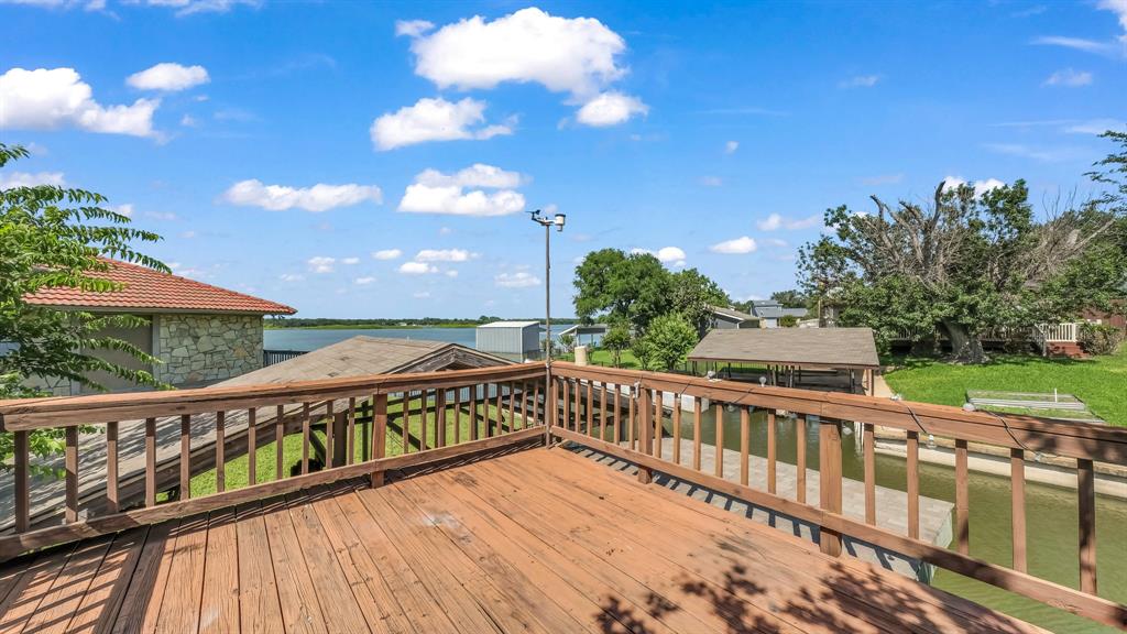 696 Harbor Drive North Azle, TX 76020 - Photo 12 of 40 a view of a balcony with wooden floor