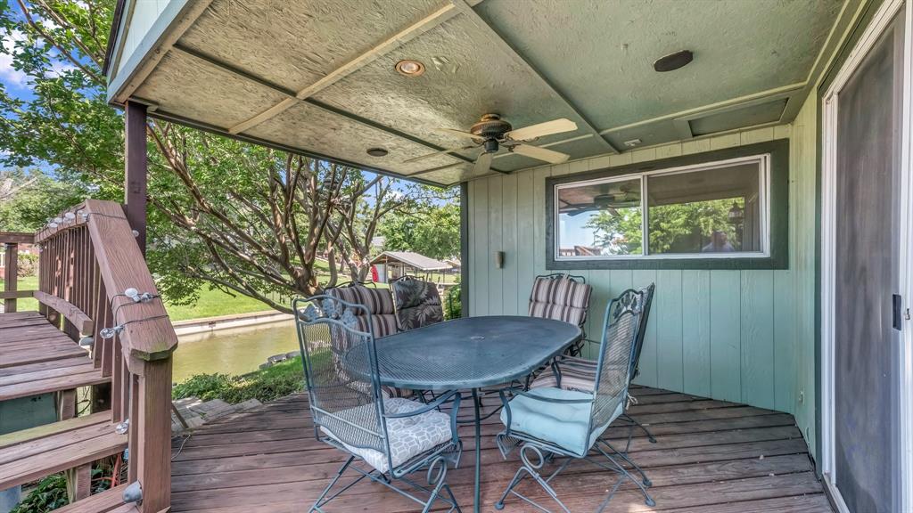 696 Harbor Drive North Azle, TX 76020 - Photo 13 of 40 a view of a porch with furniture and a yard