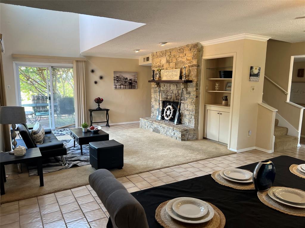 696 Harbor Drive North Azle, TX 76020 - Photo 15 of 40 a living room with furniture and a fireplace