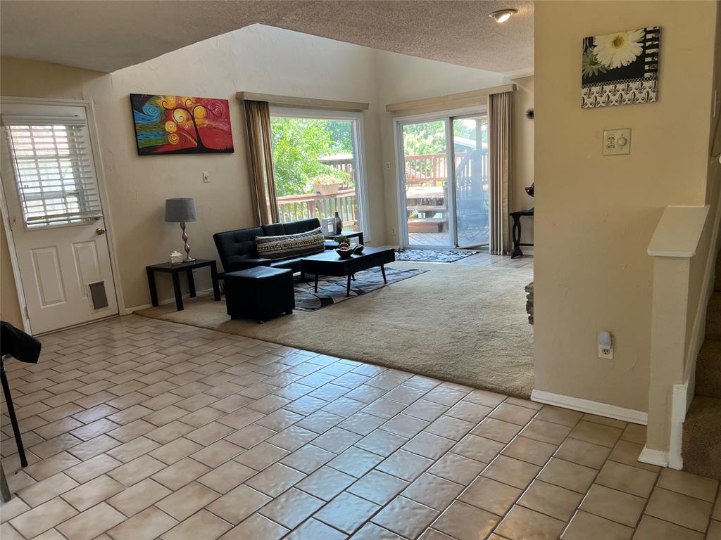 696 Harbor Drive North Azle, TX 76020 - Photo 16 of 40 a living room with furniture and a window