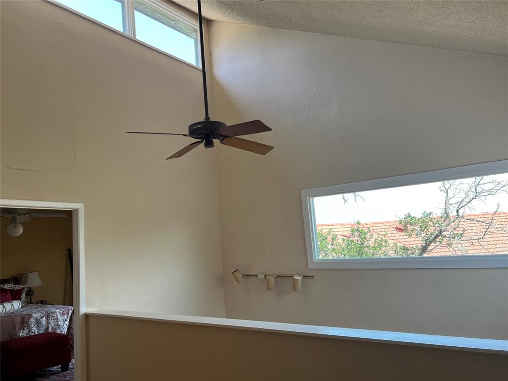 696 Harbor Drive North Azle, TX 76020 - Photo 30 of 40 a bathroom with a bathtub and a window