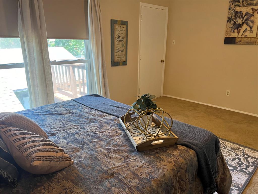 696 Harbor Drive North Azle, TX 76020 - Photo 38 of 40 a bedroom with a bed and a window