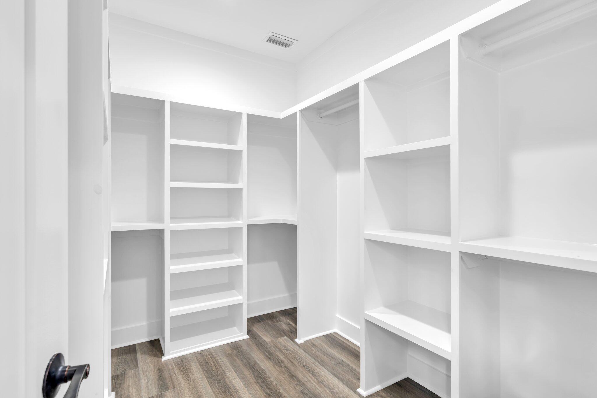 2672 Chat Holley Road Santa Rosa Beach, FL 32459 - Photo 13 of 53 a view of walk in closet with empty racks