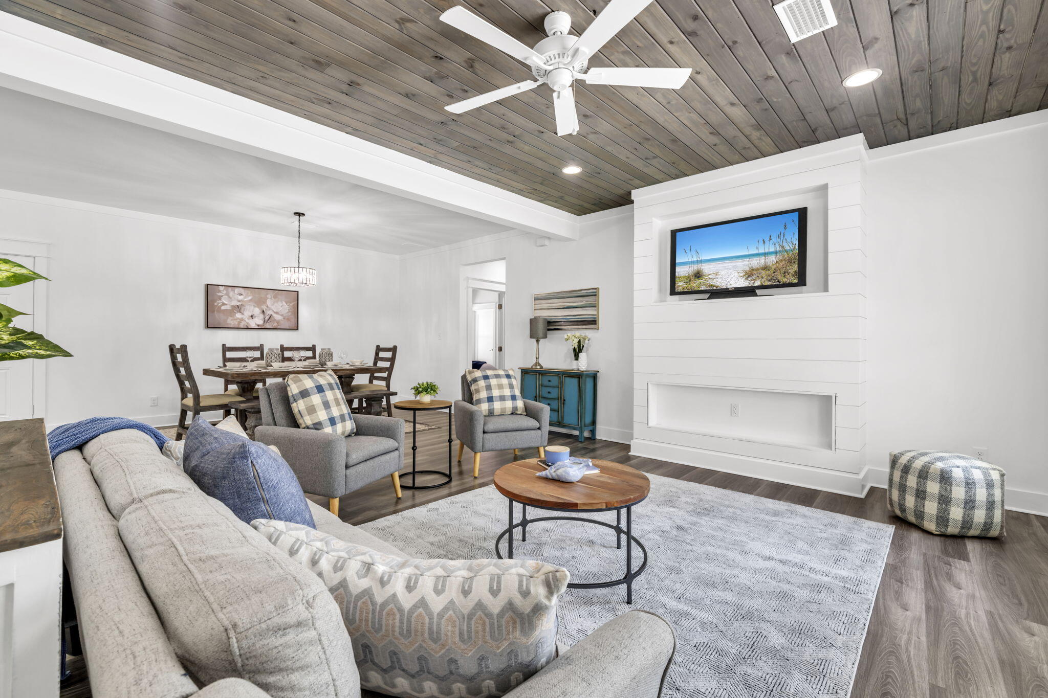 2672 Chat Holley Road Santa Rosa Beach, FL 32459 - Photo 24 of 53 a living room with furniture and a chandelier