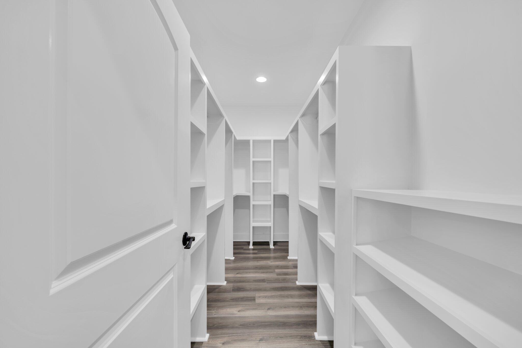 2672 Chat Holley Road Santa Rosa Beach, FL 32459 - Photo 29 of 53 a view of staircase with white walls and a window