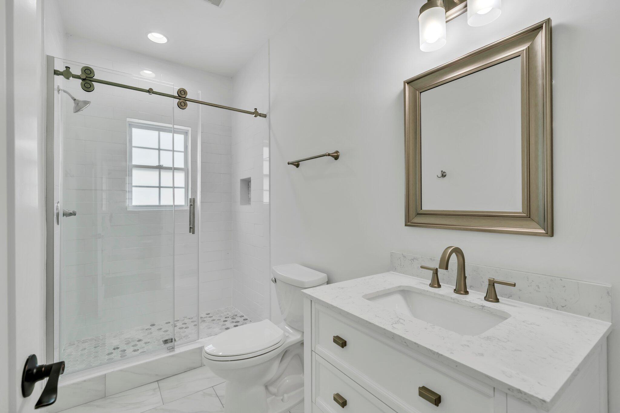 2672 Chat Holley Road Santa Rosa Beach, FL 32459 - Photo 40 of 53 a bathroom with a sink toilet and shower