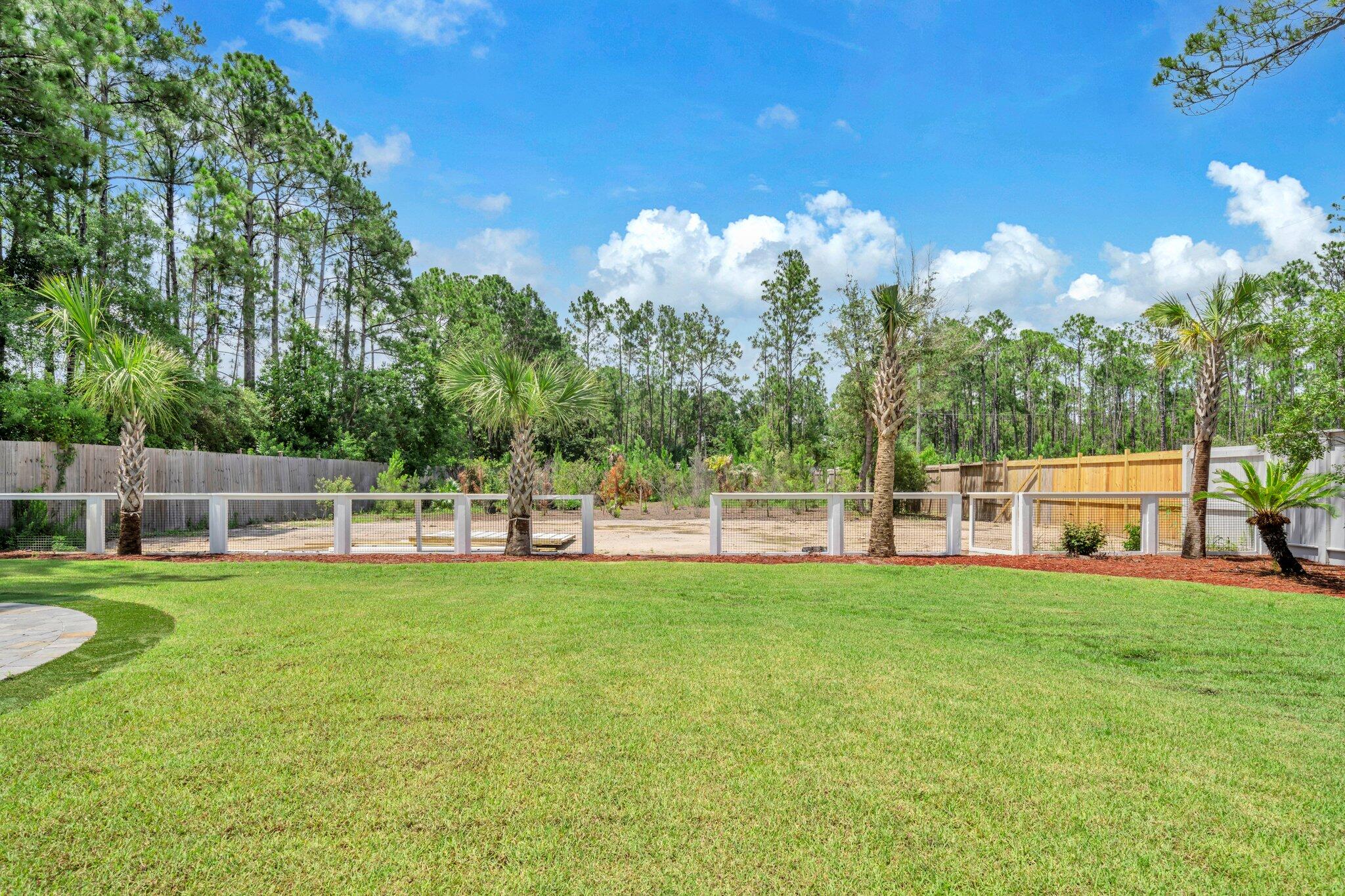2672 Chat Holley Road Santa Rosa Beach, FL 32459 - Photo 6 of 53 a view of a house with swimming pool garden and sitting area