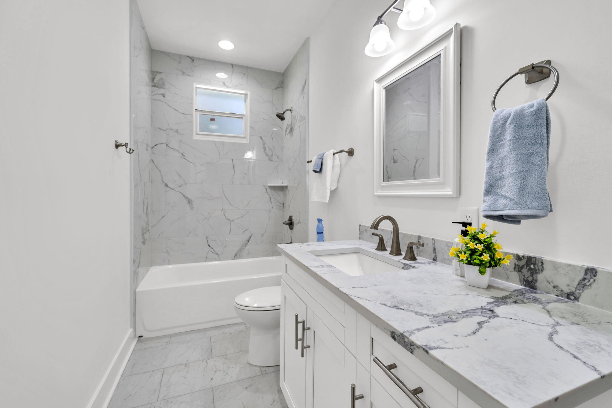 2672 Chat Holley Road Santa Rosa Beach, FL 32459 - Photo 10 of 53 a bathroom with a granite countertop sink a toilet and bathtub