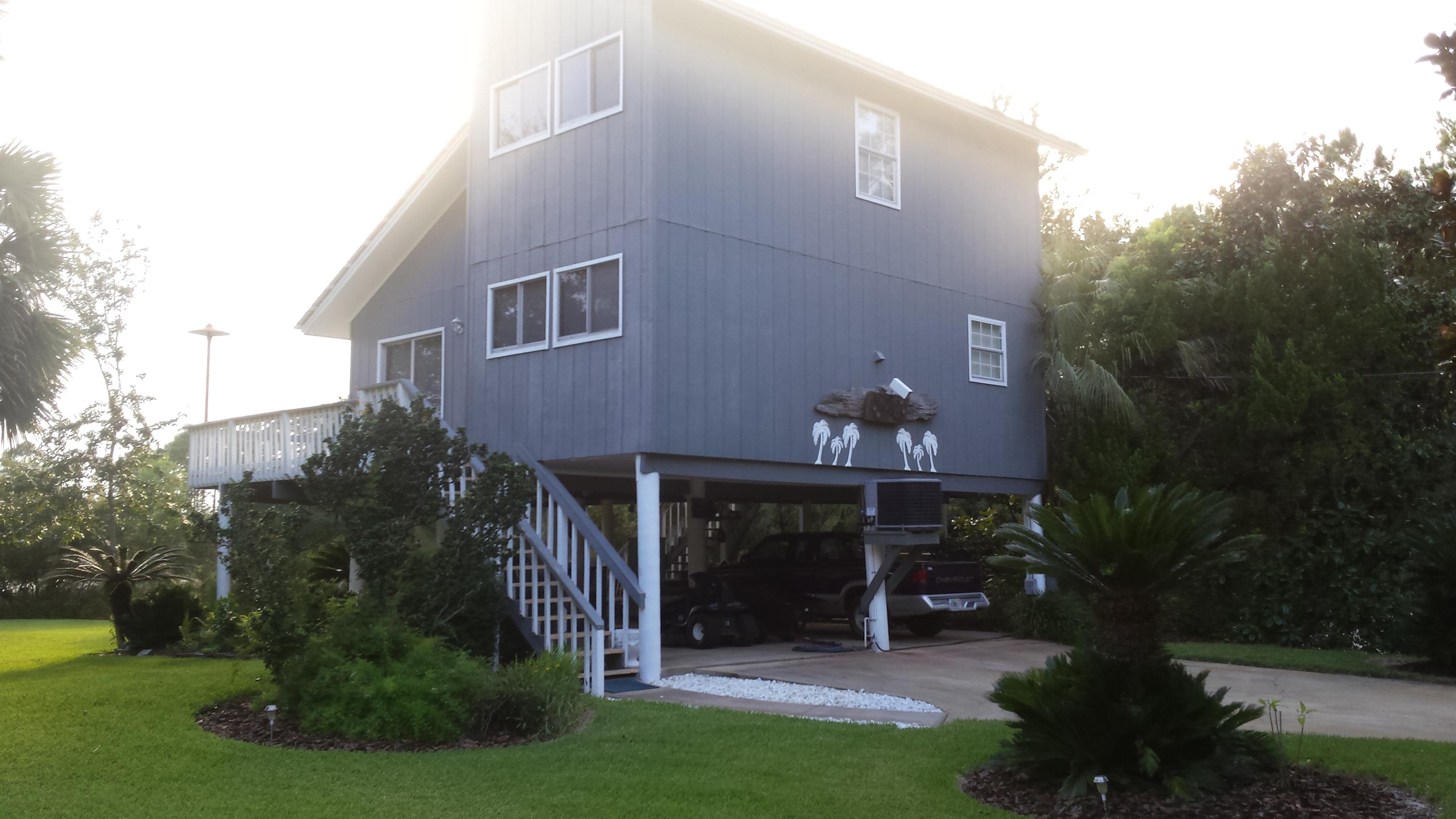 240 7th Street Santa Rosa Beach, FL 32459 - Photo 19 of 50 a front view of house with yard and green space