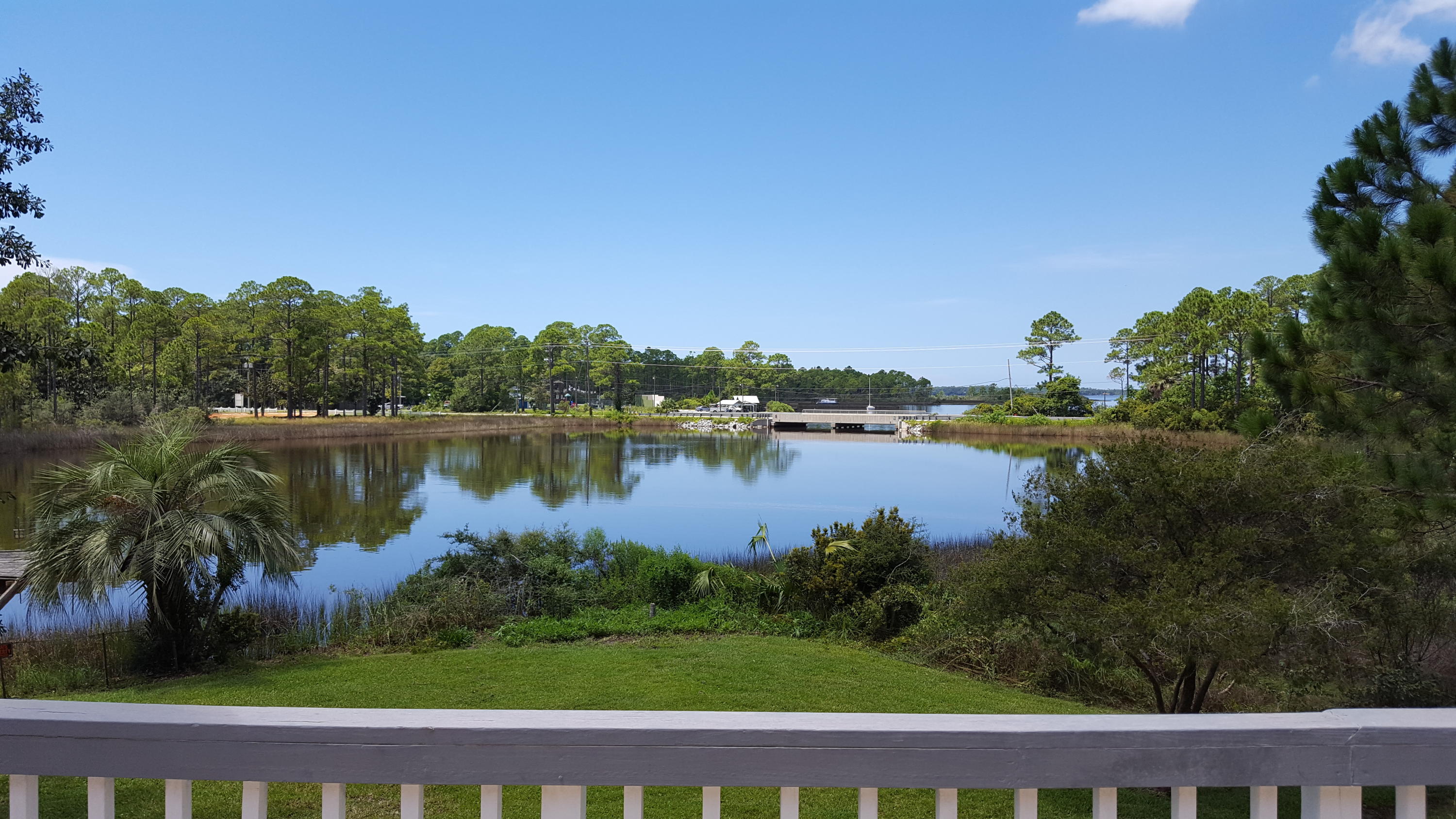 240 7th Street Santa Rosa Beach, FL 32459 - Photo 23 of 50 a view of a lake from a balcony