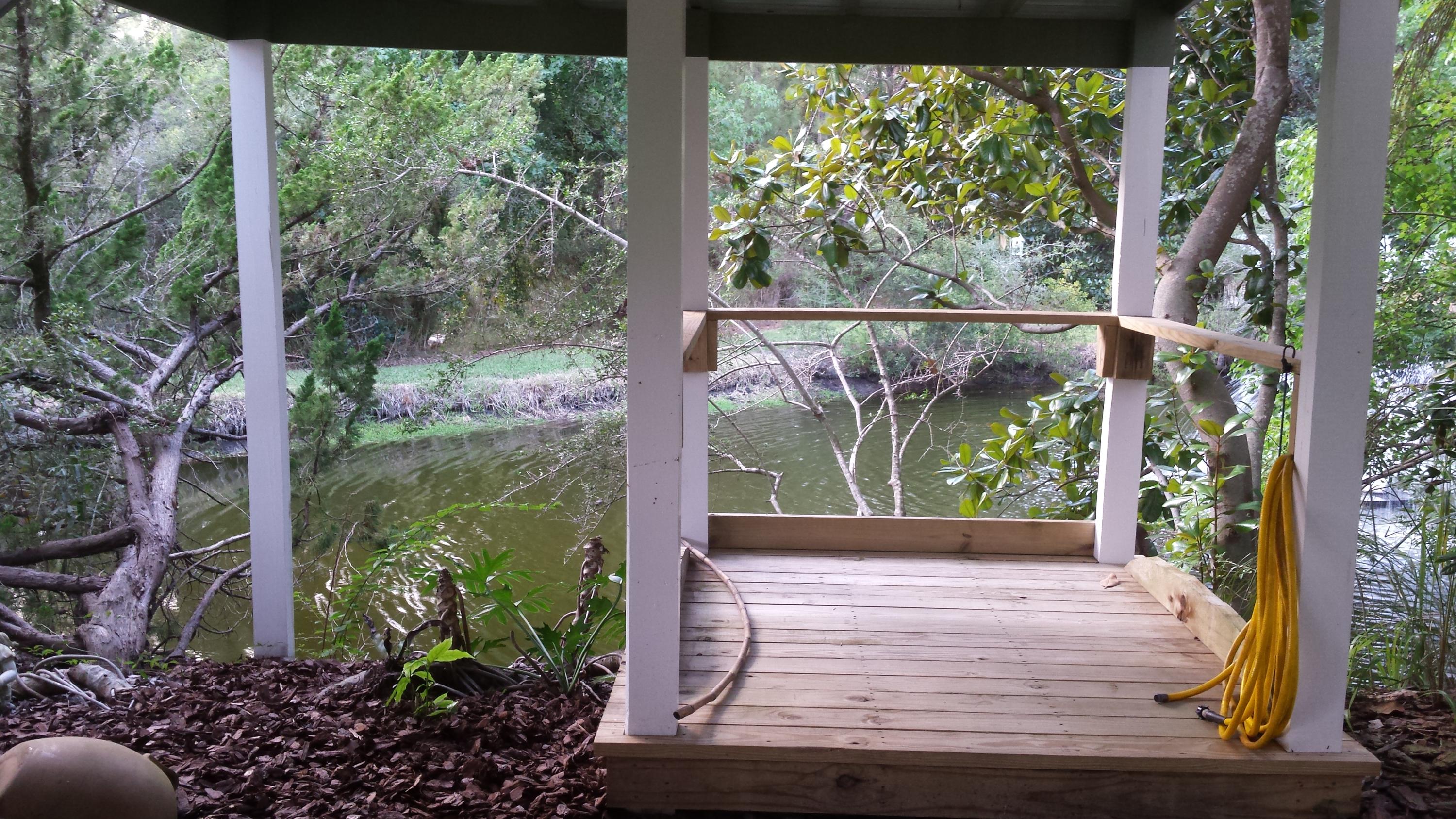 240 7th Street Santa Rosa Beach, FL 32459 - Photo 29 of 50 a view of a garden from a window