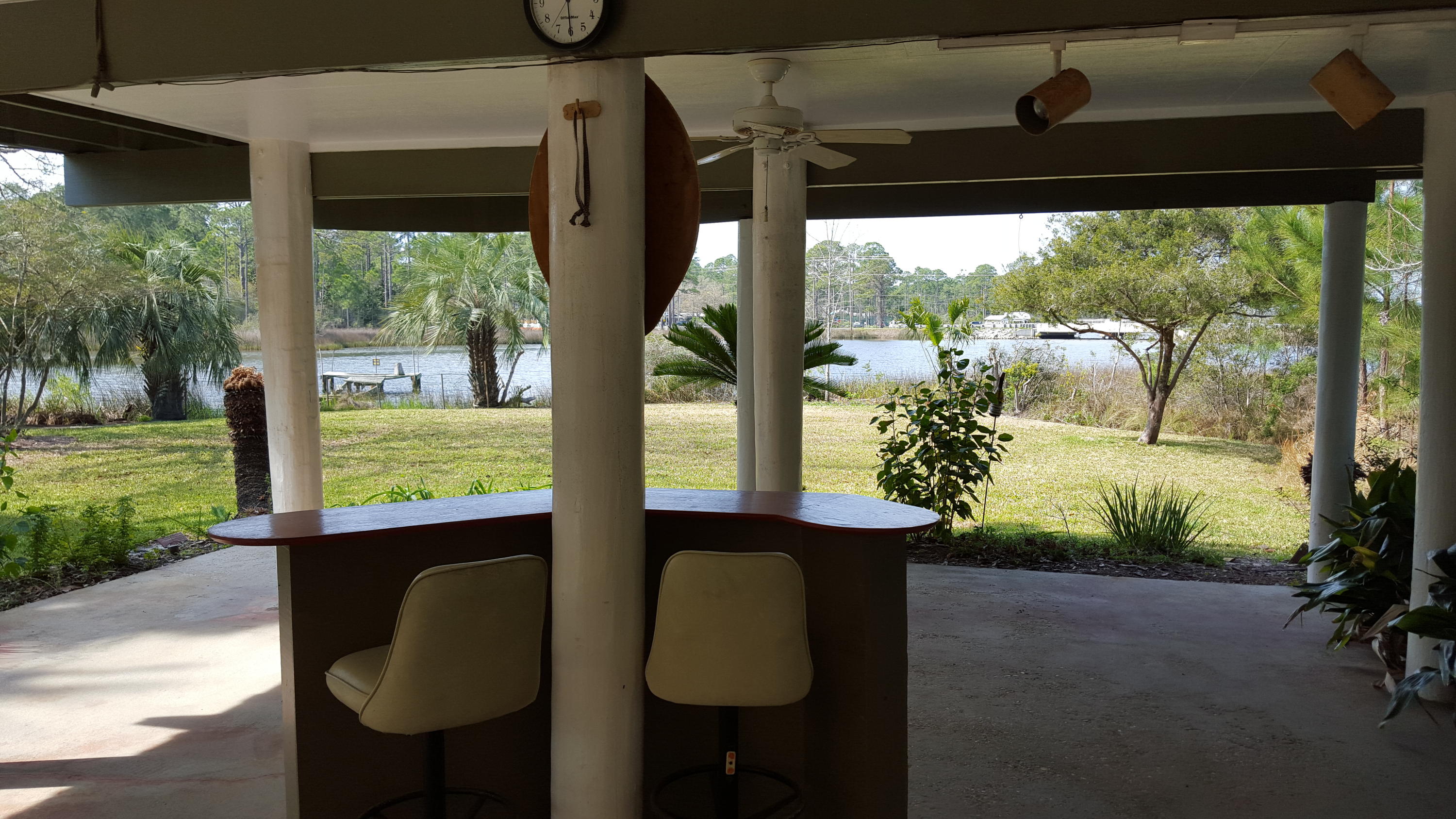 240 7th Street Santa Rosa Beach, FL 32459 - Photo 38 of 50 a view of a porch and chairs
