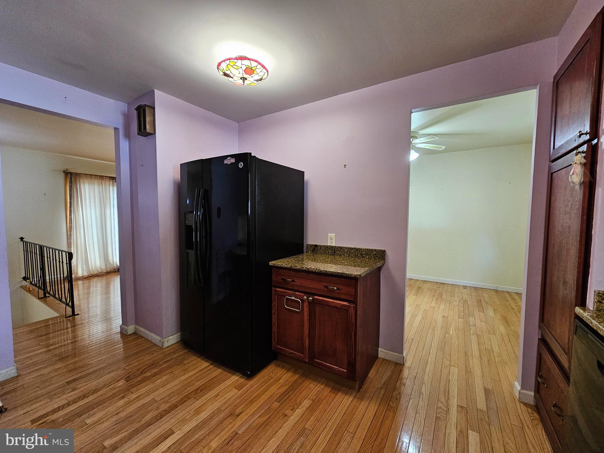 401 Cardinal Road Beverly, NJ 08010 - Photo 20 of 35 a kitchen with stainless steel appliances granite countertop a refrigerator and a stove