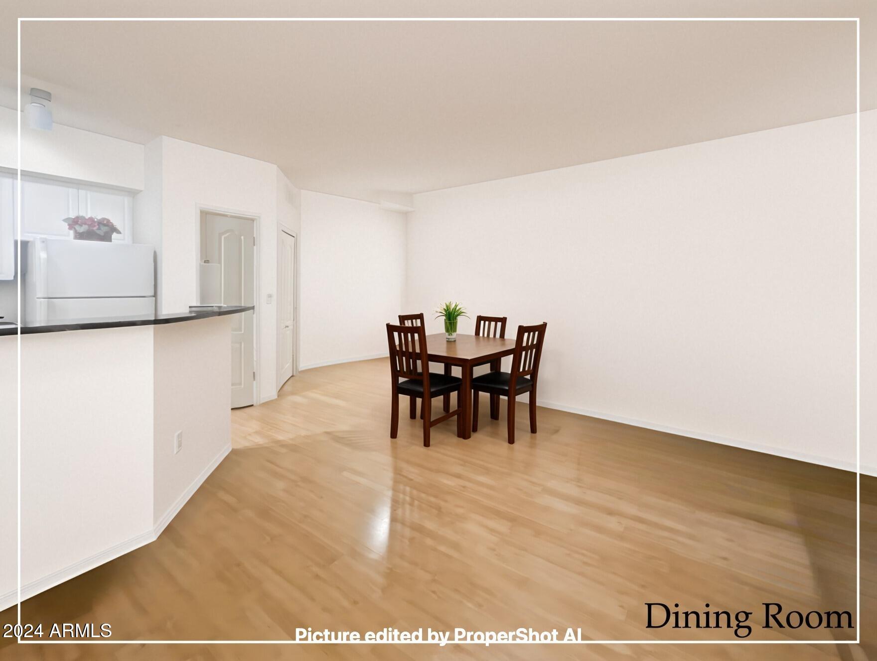 1701 East Colter Street, Unit 148 Phoenix, AZ 85016 - Photo 3 of 13 a view of a dining room with furniture
