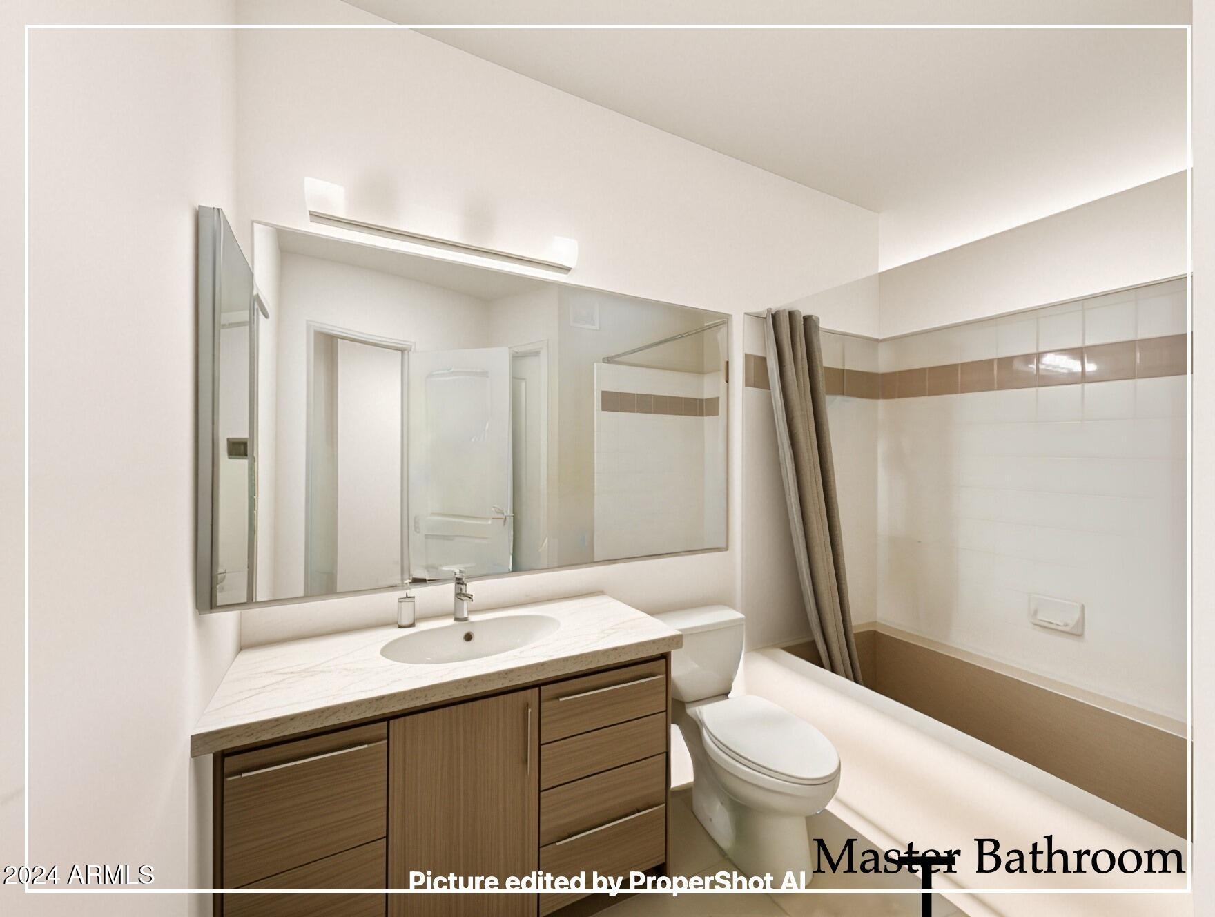 1701 East Colter Street, Unit 148 Phoenix, AZ 85016 - Photo 6 of 13 a bathroom with a sink toilet double vanity and shower