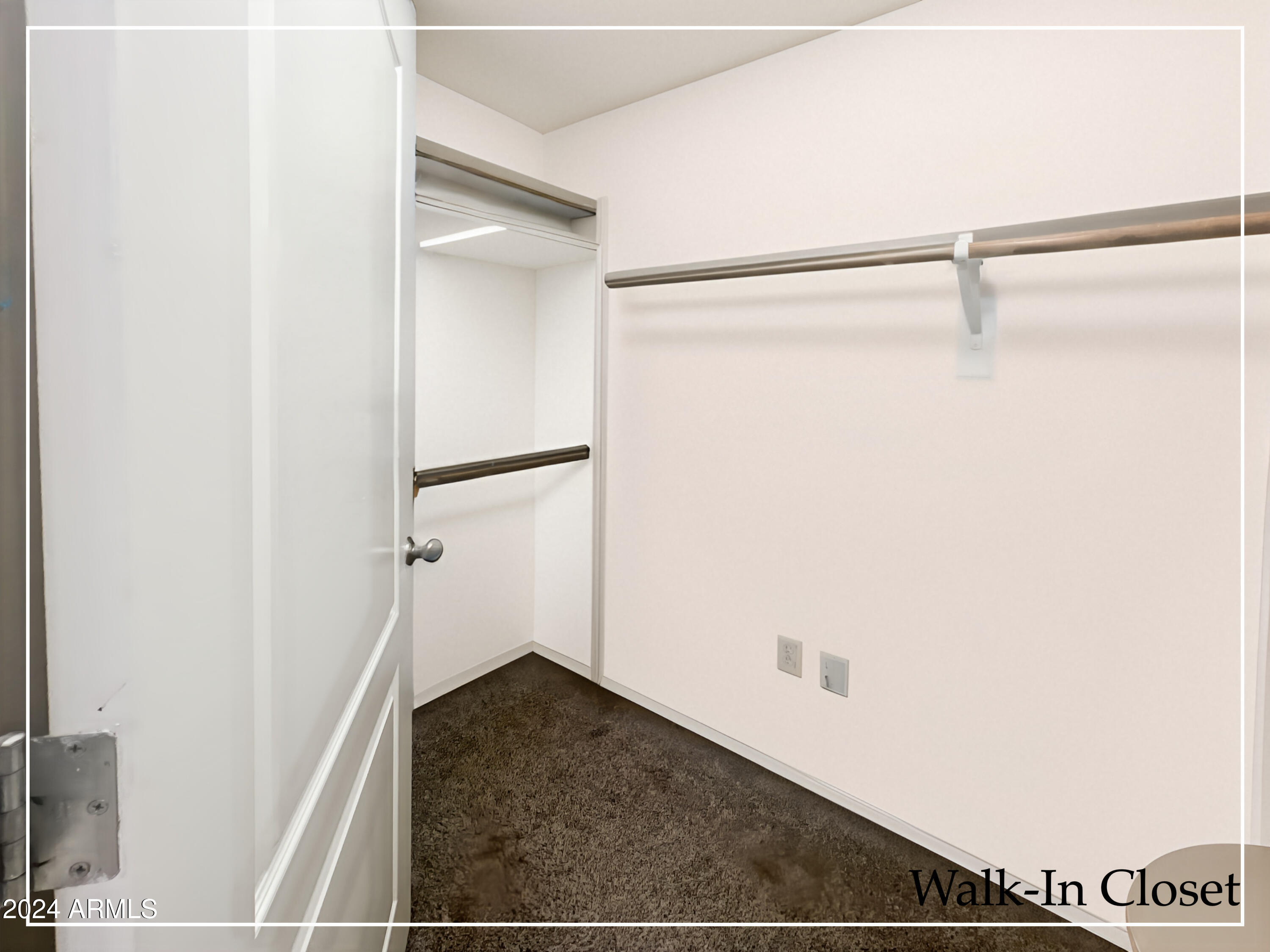 1701 East Colter Street, Unit 148 Phoenix, AZ 85016 - Photo 7 of 13 a view of walk in closet