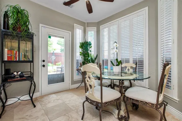 a kitchen with stainless steel appliances granite countertop a refrigerator stove top oven and sink