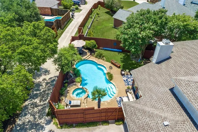 an aerial view of lake residential houses with outdoor space and street view
