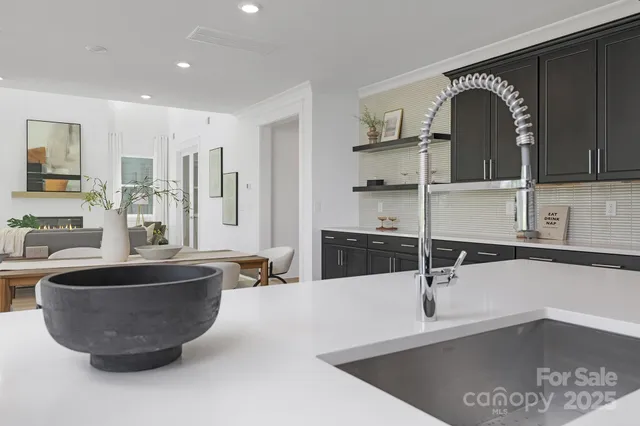 a large room with kitchen island