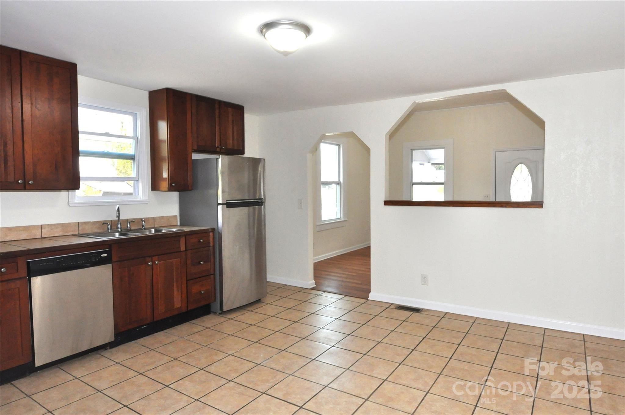 538 Pinckney Road Chester, SC 29706 - Photo 11 of 33 a kitchen with stainless steel appliances granite countertop a refrigerator and a sink