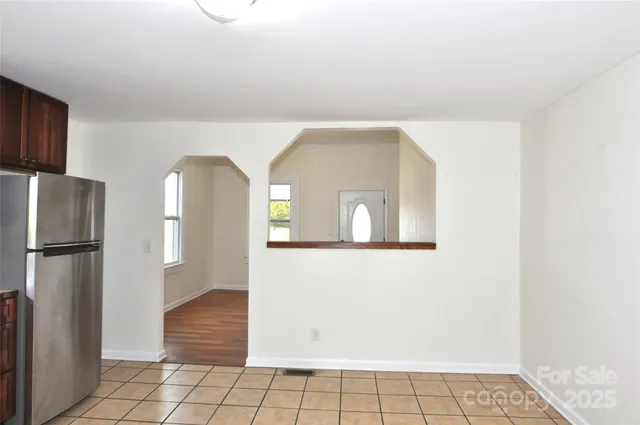 a view of a livingroom with wooden floor