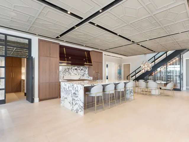 a kitchen with a stove and cabinets