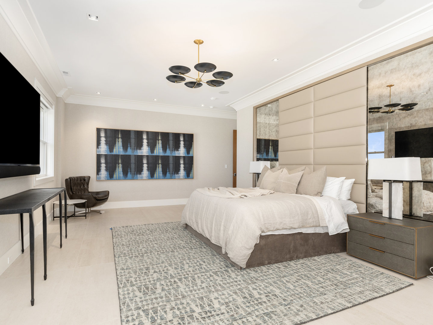 10 Illinois Street, Unit 5A St. Charles, IL 60174 - Photo 25 of 46 a bedroom with a large bed and a flat screen tv