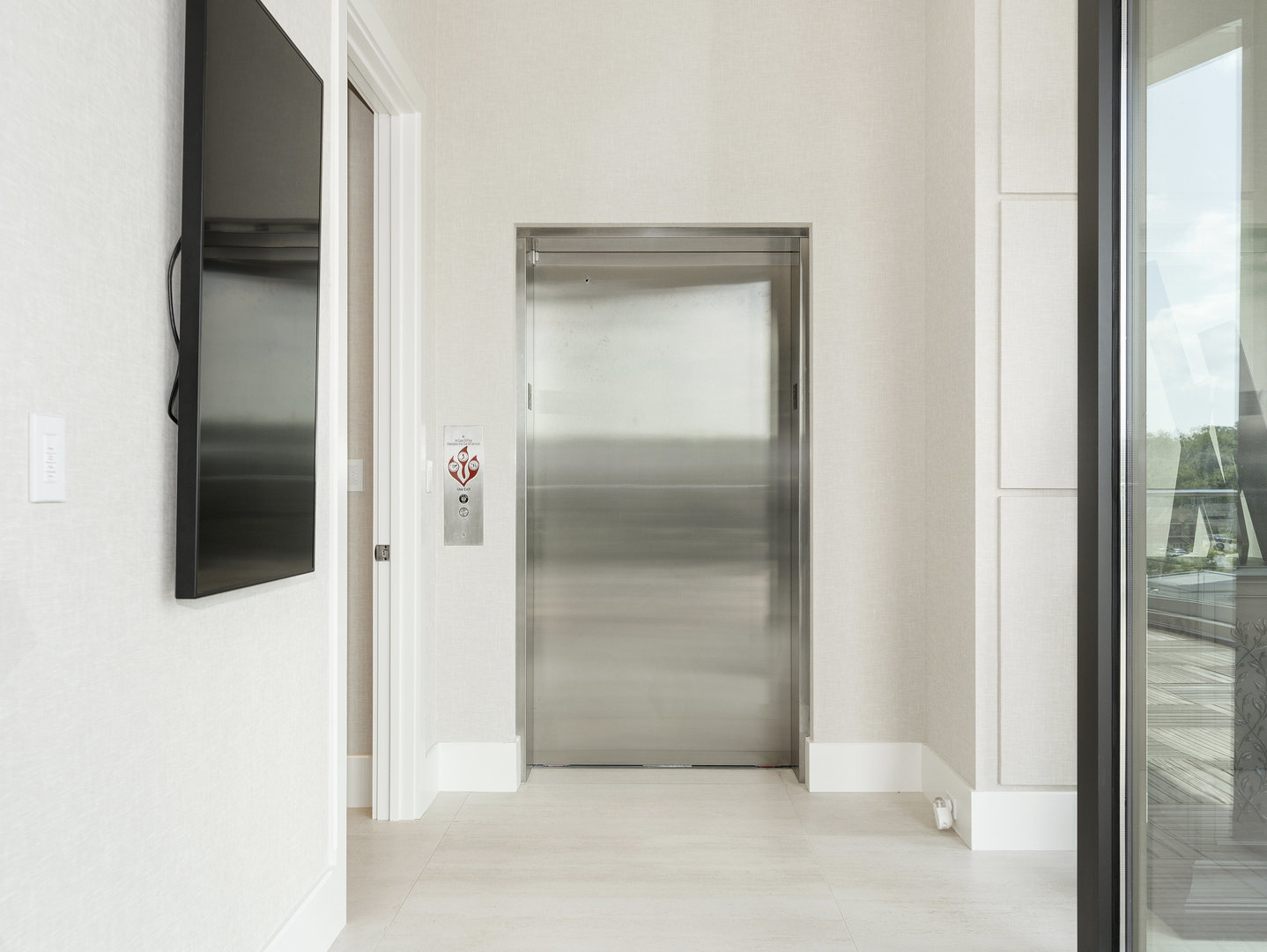 10 Illinois Street, Unit 5A St. Charles, IL 60174 - Photo 3 of 46 a view of elevator with hallway