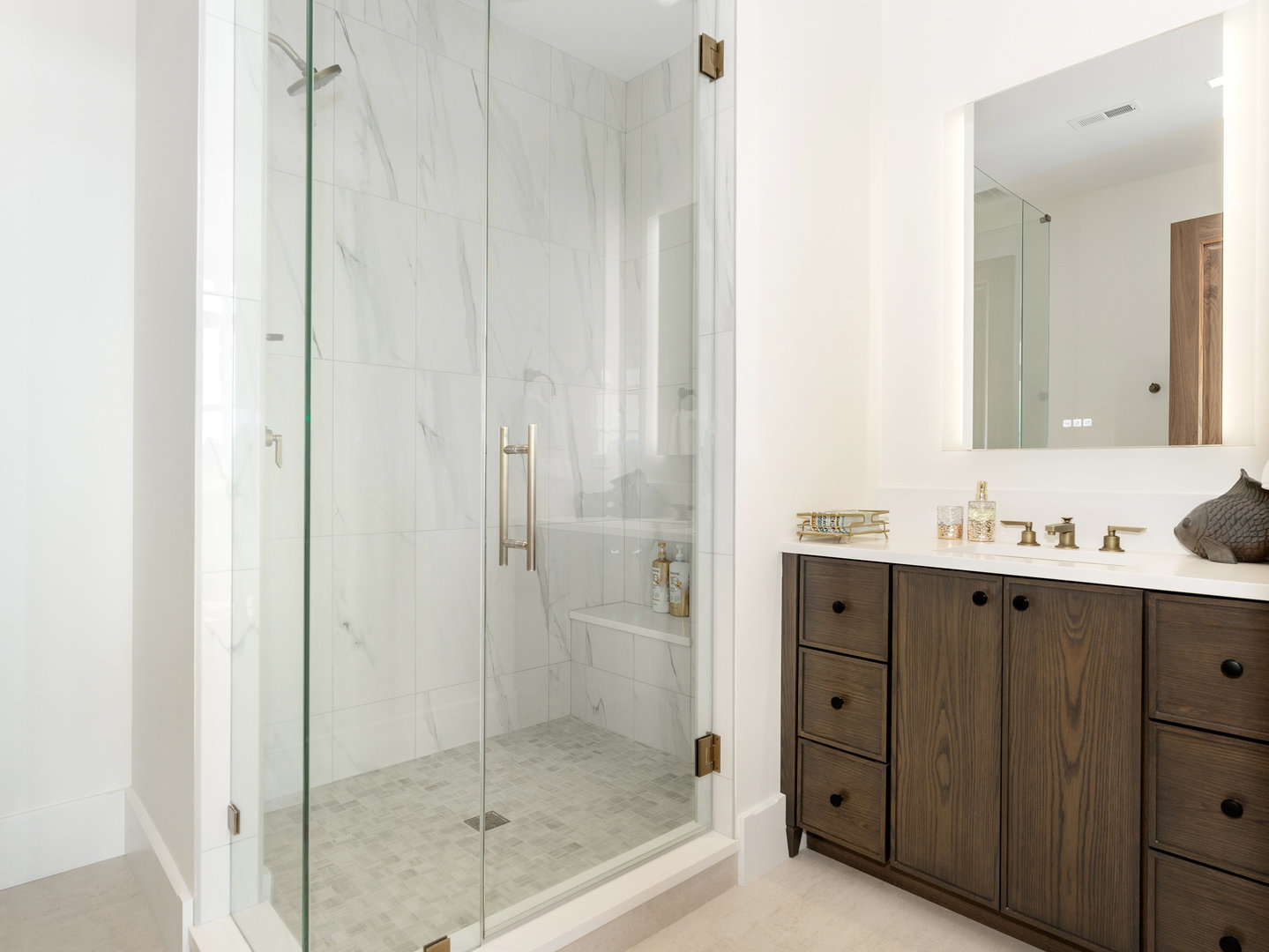 10 Illinois Street, Unit 5A St. Charles, IL 60174 - Photo 32 of 46 a bathroom with a shower sink and mirror