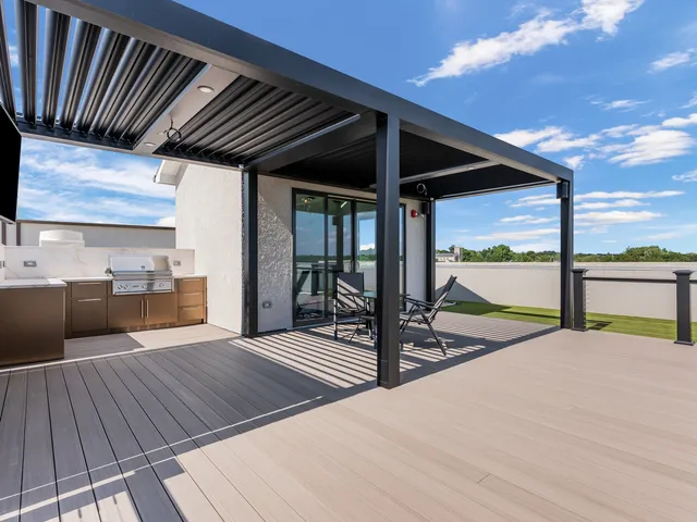 a view of a lake with a floor to ceiling windows