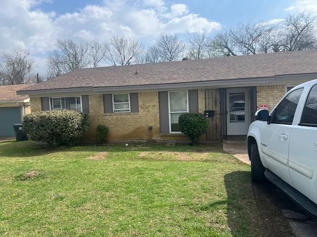 a house view with a garden space