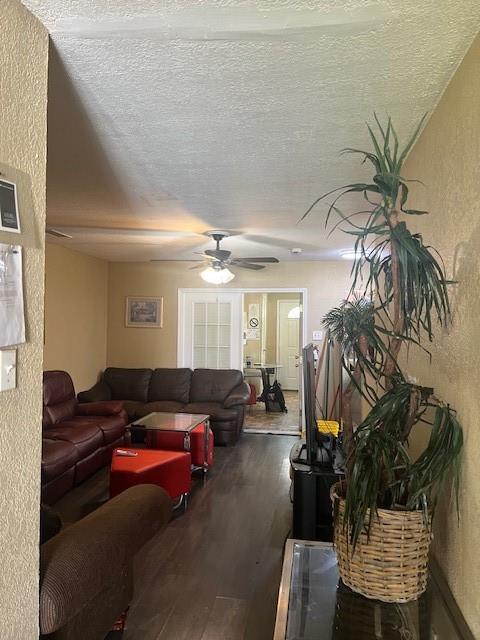 4026 Tioga Street Dallas, TX 75241 - Photo 2 of 13 a living room with furniture and a potted plant