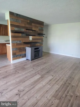 a kitchen with a stove and a sink