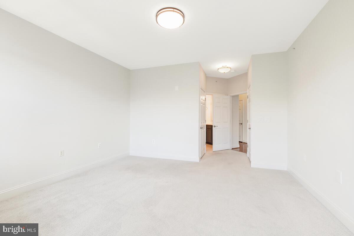 130 Chevy Chase Street, Unit 404 Gaithersburg, MD 20878 - Photo 11 of 39 a view of an empty room