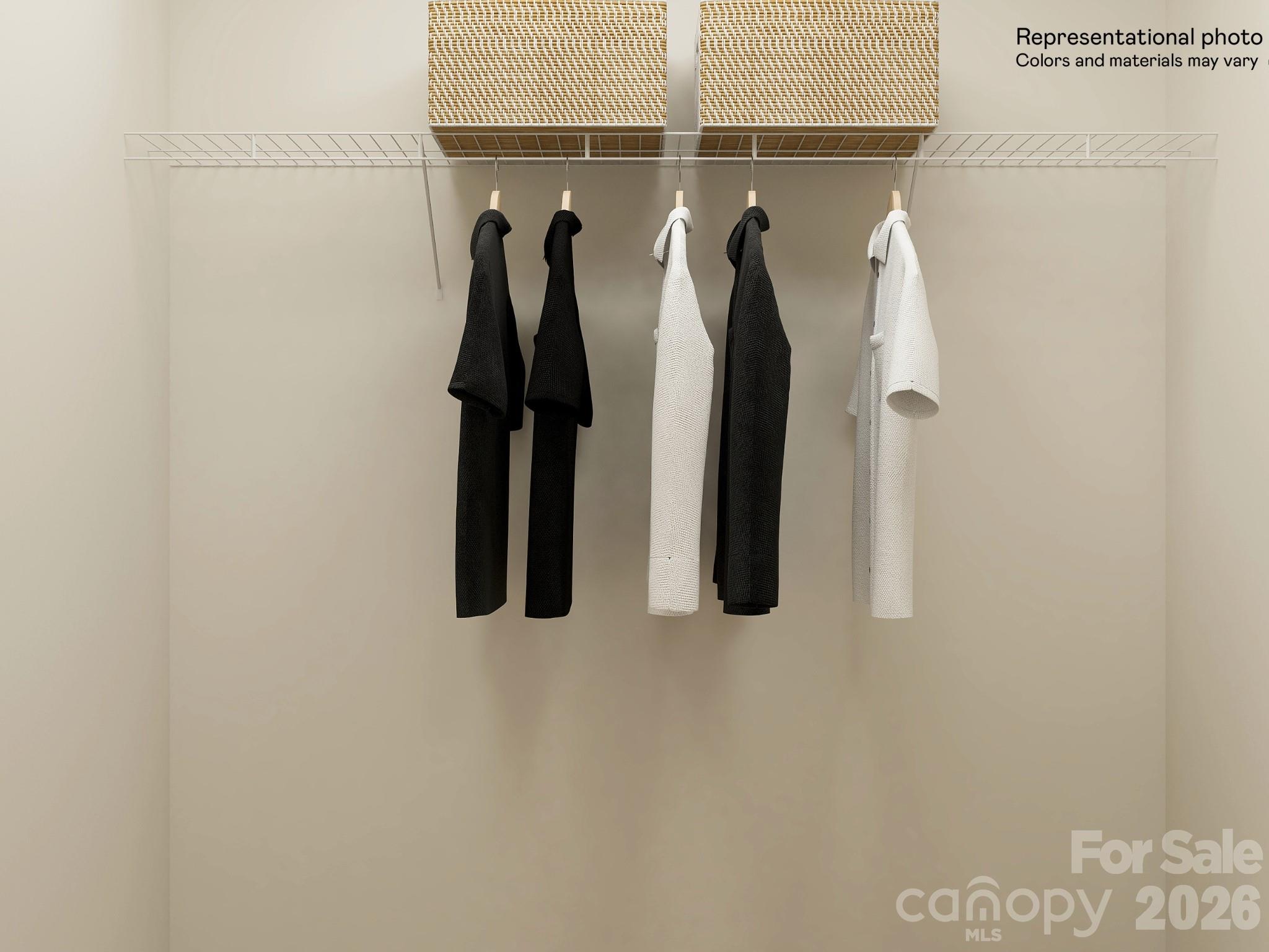 7026 Juneberry Way Maiden, NC 28650 - Photo 22 of 23 a view of walk in closet with clothes and shoes
