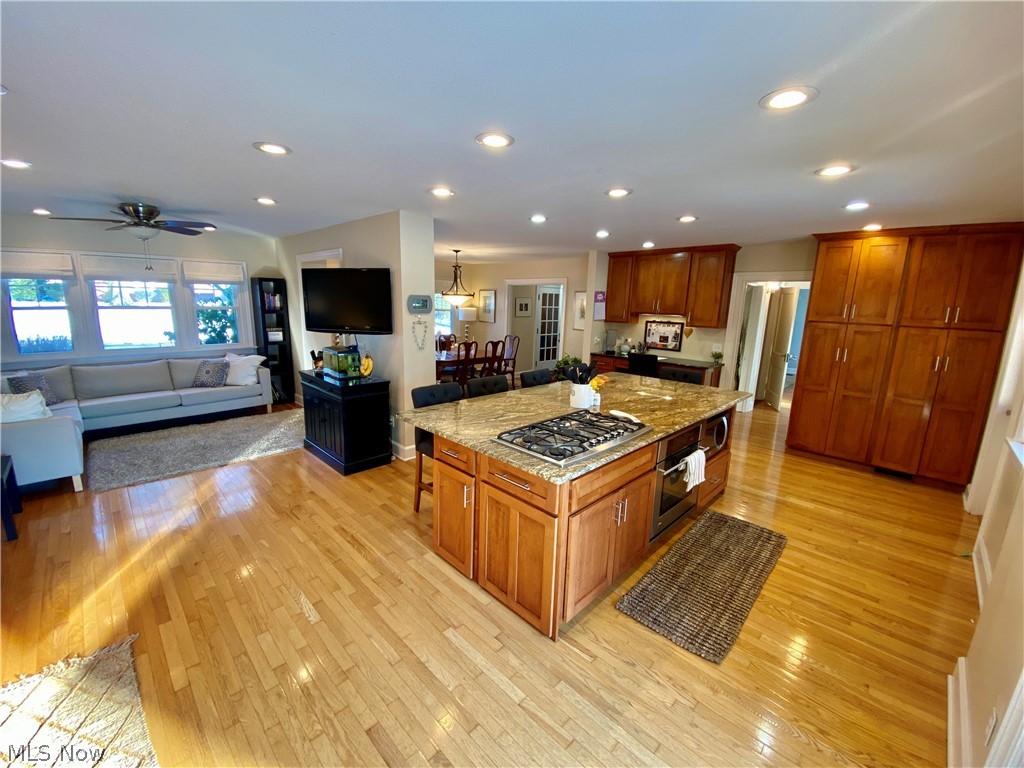 1770 Burbank Road Wooster, OH 44691 - Photo 11 of 30 Custom Cherry Cabinetry with pull out drawers, granite countertops and room for 6 large stools around the island
