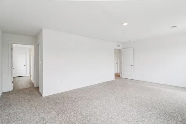 a bathroom with a shower and a sink