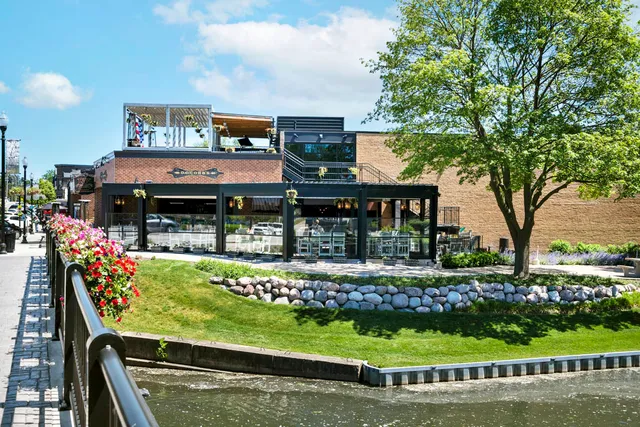 a view of outdoor space with playground and green space