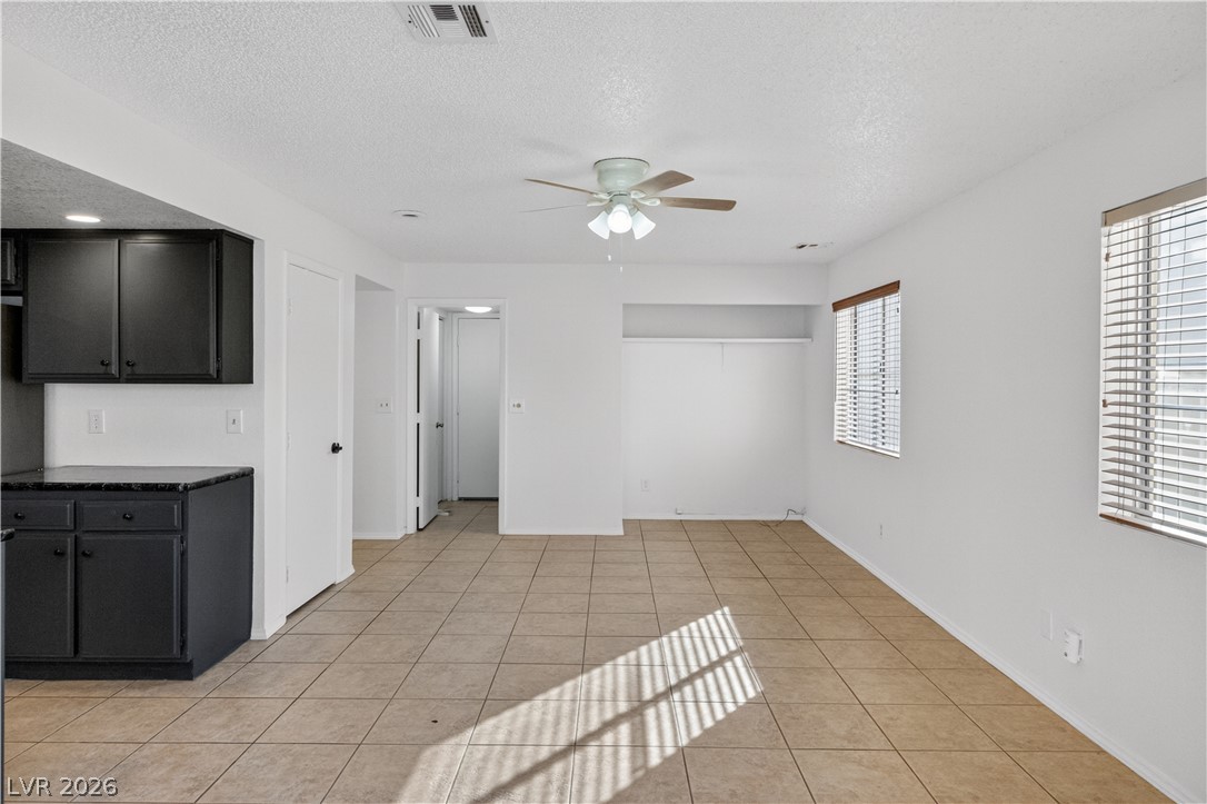 3156 Terrace View Drive Laughlin, NV 89029 - Photo 22 of 94 A versatile open-concept space featuring durable tiled flooring and ample natural light.